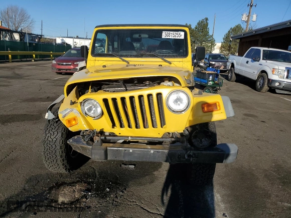 2002 Jeep Wrangler Sport with VIN 1J4FA49S52P750310, listed as a Copart auction lot 50815255 with 188,364 mi miles and Salvage Title. Bid and sale history available at carsss.com. Image 5.