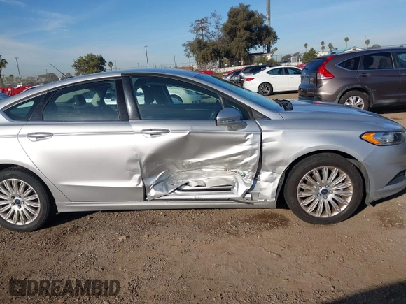 2014 Ford Fusion SE Hybrid with VIN 3FA6P0LU4ER206343, listed as a IAAI auction lot 41600260 with 198,834 mi miles and . Bid and sale history available at DreamBid. Image 6.