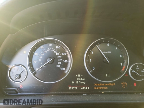 2012 BMW 5 Series 528i xDrive with VIN WBAXH5C57CDW03887, listed as a Copart auction lot 48521185 with 163,524 mi miles and Salvage Title. Bid and sale history available at carsss.com. Image 9.