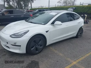 2020 Tesla Model 3 Long Range with VIN 5YJ3E1EB0LF803217, listed as a IAAI auction lot 41871940 with 130,391 mi miles. Bid and sale history available at carsss.com. Image 19.
