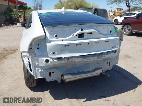 2024 Toyota Prius LE with VIN JTDACAAU5R3046244, listed as a IAAI auction lot 42464523 with 13,590 mi miles and . Bid and sale history available at DreamBid. Image 6.