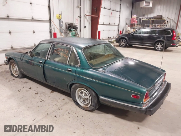 1985 Jaguar XJ with VIN SAJAV1347FC414864, listed as a IAAI auction lot 42118511 with 117,185 mi miles and . Bid and sale history available at DreamBid. Image 3.