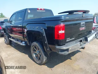 2014 GMC Sierra 1500 SLT with VIN 3GTU2VEC1EG363079, listed as a IAAI auction lot 42419679 with 128,055 mi miles and . Bid and sale history available at DreamBid. Image 3.