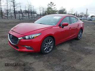2018 Mazda 3 Touring with VIN 3MZBN1V36JM196315, listed as a IAAI auction lot 41856596 with 79,783 mi miles and . Bid and sale history available at DreamBid. Image 2.