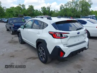 2024 Subaru Crosstrek Premium with VIN JF2GUADC2R8913808, listed as a IAAI auction lot 42171997 with 1,219 mi miles and . Bid and sale history available at DreamBid. Image 3.