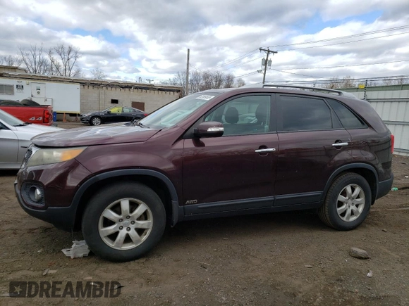 2011 Kia Sorento LX with VIN 5XYKTCA13BG055192, listed as a Copart auction lot 52969655 with 263,011 mi miles and Salvage Title. Bid and sale history available at DreamBid. Image 1.