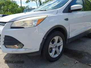 2014 Ford Escape SE z VIN 1FMCU9G95EUE14557, wystawiony jako IAAI lot #42152133 z przebiegiem 164 544 mil mil oraz . Historia ofert i sprzedaży dostępna na DreamBid. Obrazek 6.