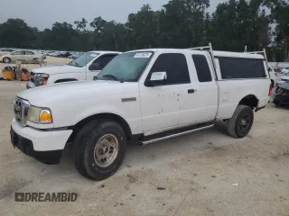2009 Ford Ranger XLT with VIN 1FTYR44E49PA56503, listed as a Copart auction lot 64126025 with 219,029 mi miles and Salvage title. Bid and sale history available at DreamBid. Image 1.