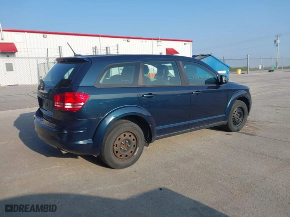 2014 Dodge Journey SE with VIN 3C4PDCAB5ET216618, listed as a IAAI auction lot 41973946 with 151,693 mi miles. Bid and sale history available at carsss.com. Image 4.