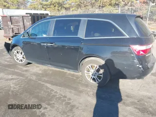 2011 Honda Odyssey EX-L with VIN 5FNRL5H61BB059275, listed as a IAAI auction lot 41293690 with 105,511 mi miles and . Bid and sale history available at carsss.com. Image 3.