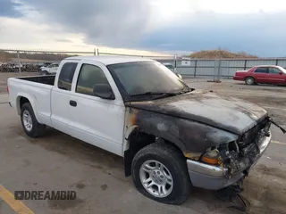 2003 Dodge Dakota SLT z VIN 1D7HL42X33S181413, wystawiony jako IAAI lot #42000892 z przebiegiem Nie podano mil oraz . Historia ofert i sprzedaży dostępna na DreamBid. Obrazek 1.