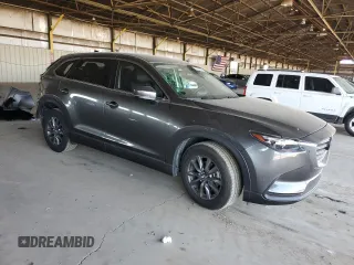 2021 Mazda CX-9 Touring z VIN JM3TCACYXM0520912, wystawiony jako Copart lot #60726695 z przebiegiem 36 506 mil mil oraz Szkoda całkowita • Salvage title. Historia ofert i sprzedaży dostępna na DreamBid. Obrazek 4.