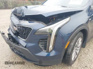 2021 Cadillac XT4 AWD Sport with VIN 1GYFZFR45MF053573, listed as a IAAI auction lot 41909784 with 36,309 mi miles and . Bid and sale history available at DreamBid. Image 18.