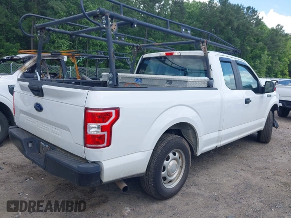 2018 Ford F-150 XL with VIN 1FTEX1CB5JFE55932, listed as a IAAI auction lot 42298917 with 143,923 mi miles and . Bid and sale history available at DreamBid. Image 4.