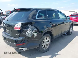 2011 Mazda CX-9 Sport with VIN JM3TB2BA7B0303120, listed as a IAAI auction lot 42427053 with 219,673 mi miles and . Bid and sale history available at DreamBid. Image 6.