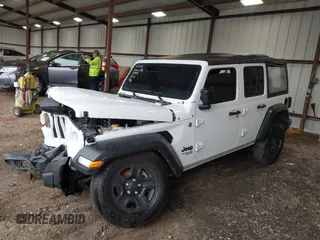 2021 Jeep Wrangler Unlimited Willys with VIN 1C4HJXDN4MW790999, listed as a IAAI auction lot 42236588 with 53,954 mi miles and . Bid and sale history available at DreamBid. Image 2.