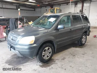 2005 Honda Pilot EX-L with RES with VIN 2HKYF18655H521175, listed as a IAAI auction lot 41490812 with 357,033 mi miles. Bid and sale history available at carsss.com. Image 20.