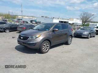 2014 Kia Sportage LX with VIN KNDPBCAC4E7629701, listed as a IAAI auction lot 42097140 with 183,552 mi miles and . Bid and sale history available at carsss.com. Image 2.
