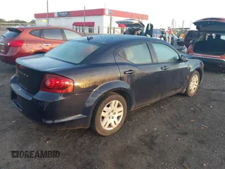 2014 Dodge Avenger SE with VIN 1C3CDZAB2EN108754, listed as a IAAI auction lot 42084617 with 144,074 mi miles. Bid and sale history available at carsss.com. Image 4.