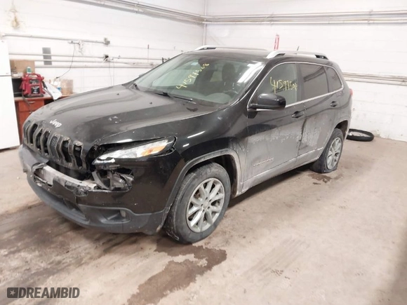 2014 Jeep Cherokee Latitude with VIN 1C4PJMCS0EW321380, listed as a IAAI auction lot 41597508 with 173,991 mi miles. Bid and sale history available at carsss.com. Image 2.
