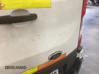 2016 Ford Transit Cargo z VIN 1FTYE1YM5GKB48743, wystawiony jako IAAI lot #42849622 z przebiegiem 200 188 mil mil oraz . Historia ofert i sprzedaży dostępna na DreamBid. Obrazek 16.