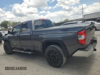 2019 Toyota Tundra SR with VIN 5TFRM5F13KX141745, listed as a Copart auction lot 56910955 with 67,856 mi miles and Salvage title. Bid and sale history available at DreamBid. Image 2.
