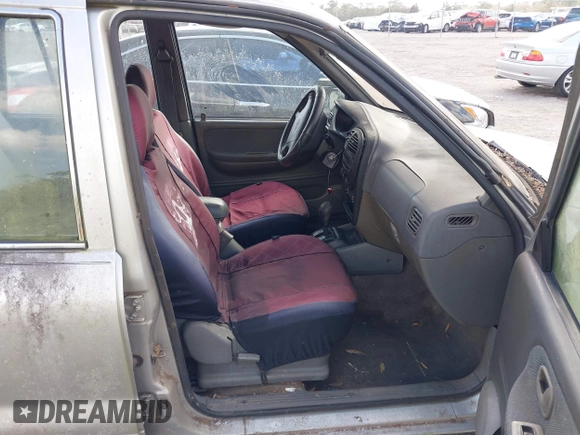 2001 Kia Sportage with VIN KNDJB723115706221, listed as a IAAI auction lot 41562713 with 99,378 mi miles. Bid and sale history available at carsss.com. Image 5.