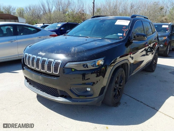 2019 Jeep Cherokee Latitude Plus with VIN 1C4PJLLBXKD176124, listed as a IAAI auction lot 41851150 with 90,101 mi miles. Bid and sale history available at carsss.com. Image 2.