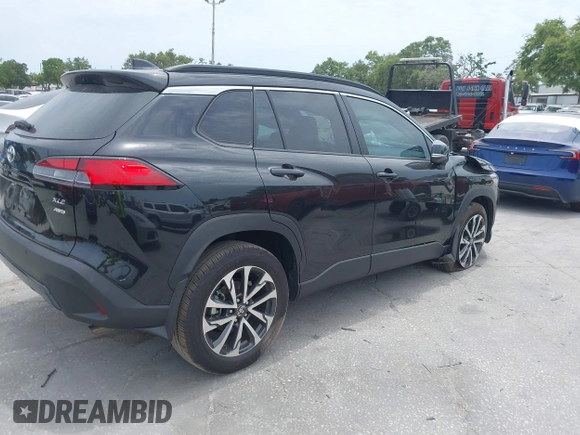2024 Toyota Corolla Cross XLE with VIN 7MUEAABG8RV084586, listed as a IAAI auction lot 42211214 with 16,316 mi miles and . Bid and sale history available at DreamBid. Image 4.