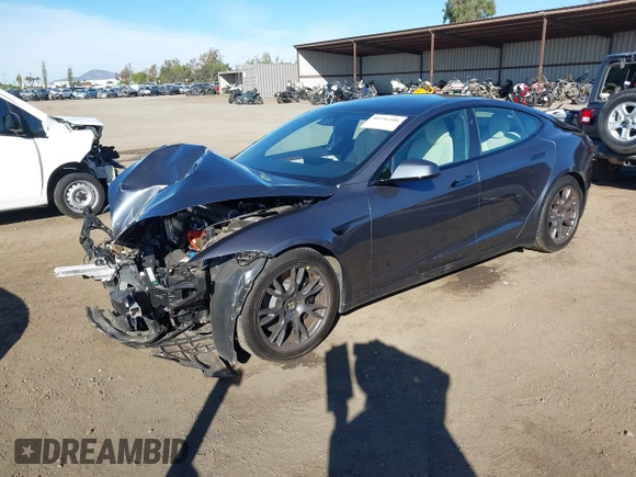 2023 Tesla Model S with VIN 5YJSA1E5XPF500341, listed as a IAAI auction lot 40756406 with 11,583 mi miles and . Bid and sale history available at DreamBid. Image 2.