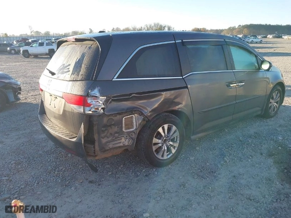 2015 Honda Odyssey EX-L with VIN 5FNRL5H62FB038540, listed as a IAAI auction lot 41826740 with 166,298 mi miles. Bid and sale history available at carsss.com. Image 4.