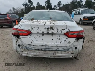 2020 Toyota Camry LE with VIN 4T1C11AK4LU930850, listed as a Copart auction lot 47626665 with 115,824 mi miles and Salvage Title. Bid and sale history available at DreamBid. Image 6.