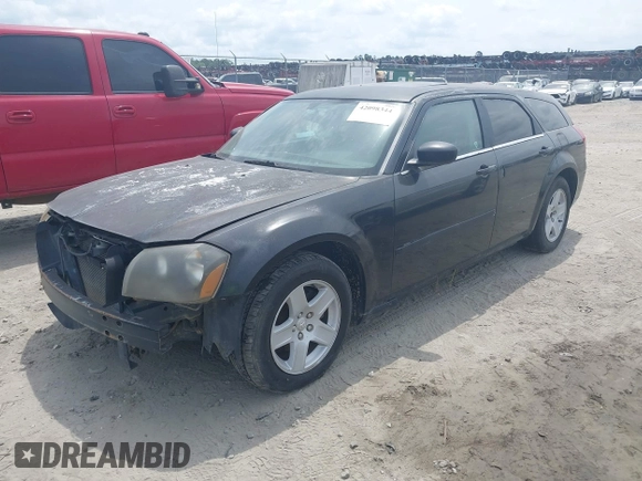 2005 Dodge Magnum SE with VIN 2D4FV48VX5H128545, listed as a IAAI auction lot 42098344 with Not Provided miles. Bid and sale history available at carsss.com. Image 2.
