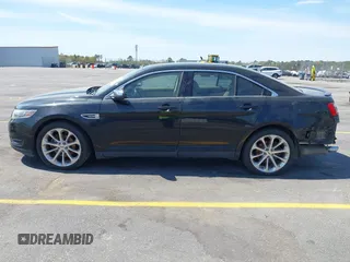 2015 Ford Taurus Limited with VIN 1FAHP2J81FG134973, listed as a IAAI auction lot 41845384 with 139,203 mi miles. Bid and sale history available at carsss.com. Image 14.