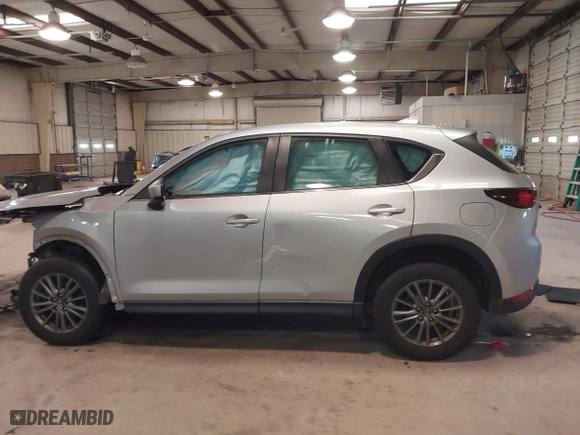 2017 Mazda CX-5 Sport with VIN JM3KFBBL1H0116157, listed as a IAAI auction lot 41584679 with 92,325 mi miles. Bid and sale history available at carsss.com. Image 14.