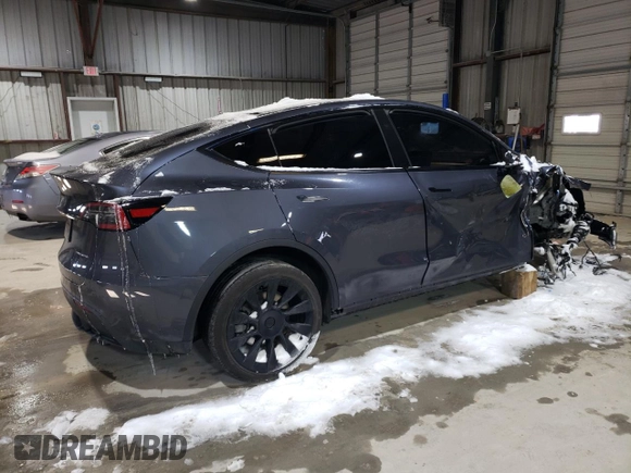 2023 Tesla Model Y Long Range z VIN 7SAYGAEE3PF968231, wystawiony jako Copart lot #45811385 z przebiegiem Nie podano mil oraz Szkoda całkowita • Salvage title. Historia ofert i sprzedaży dostępna na DreamBid. Obrazek 3.