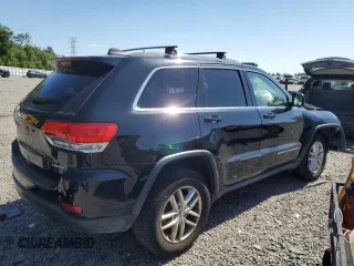 2017 Jeep Grand Cherokee Laredo with VIN 1C4RJEAG9HC780281, listed as a Copart auction lot 50747024 with 100,446 mi miles and Salvage title. Bid and sale history available at DreamBid. Image 3.
