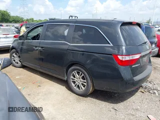 2011 Honda Odyssey EX-L with VIN 5FNRL5H62BB063125, listed as a IAAI auction lot 42562541 with 140,787 mi miles and . Bid and sale history available at DreamBid. Image 3.