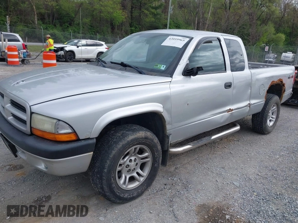2003 Dodge Dakota Sport with VIN 1D7HG32N13S132871, listed as a IAAI auction lot 42059965 with 125,408 mi miles and . Bid and sale history available at carsss.com. Image 2.
