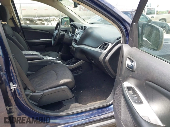 2018 Dodge Journey SE with VIN 3C4PDCAB7JT519491, listed as a IAAI auction lot 41974735 with 135,072 mi miles and . Bid and sale history available at DreamBid. Image 5.