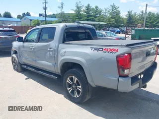 2019 Toyota Tacoma SR with VIN 3TMCZ5AN1KM274625, listed as a IAAI auction lot 42660593 with 163,460 mi miles and . Bid and sale history available at DreamBid. Image 3.