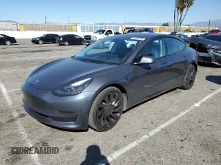 2022 Tesla Model 3 Performance with VIN 5YJ3E1EC6NF231565, listed as a Copart auction lot 46469295 with 13,474 mi miles and Salvage Title. Bid and sale history available at carsss.com. Image 1.