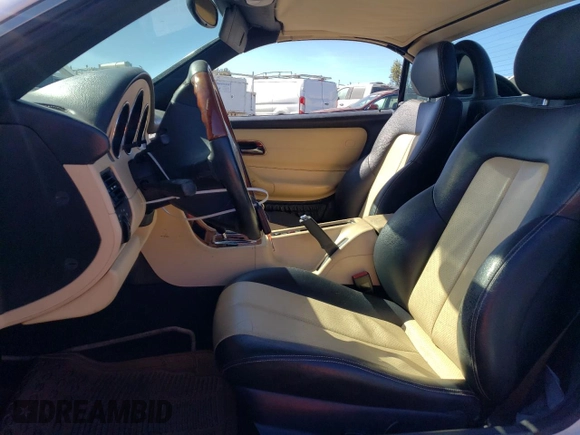 2001 Mercedes-Benz SLK 230/320 with VIN WDBKK65F41F235419, listed as a Copart auction lot 77407374 with 79,238 mi miles and Salvage Title. Bid and sale history available at DreamBid. Image 7.