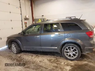 2016 Dodge Journey R/T with VIN 3C4PDDFGXGT221231, listed as a IAAI auction lot 41621414 with 130,555 mi miles and . Bid and sale history available at DreamBid. Image 14.