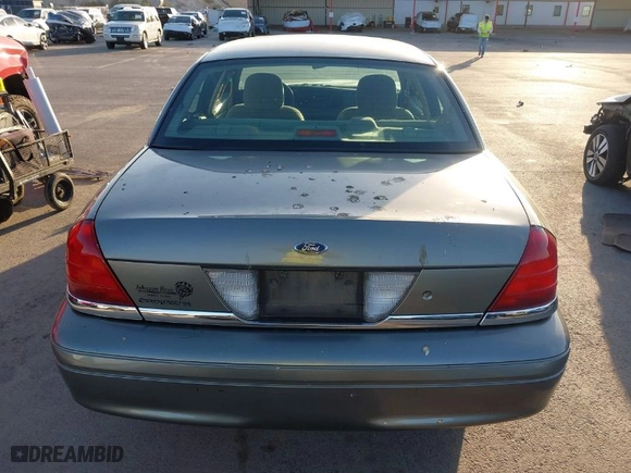 2004 Ford Crown Victoria Standard with VIN 2FAFP73W64X107579, listed as a IAAI auction lot 41823273 with 131,921 mi miles. Bid and sale history available at carsss.com. Image 17.