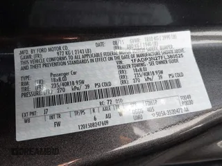 2015 Ford Focus Titanium with VIN 1FADP3N27FL380525, listed as a IAAI auction lot 42493542 with 86,423 mi miles and . Bid and sale history available at DreamBid. Image 9.