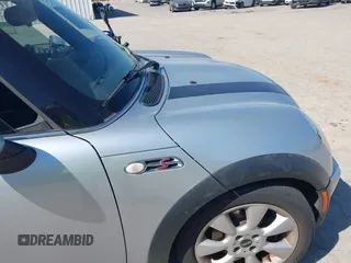 2006 MINI Convertible S with VIN WMWRH33596TK59633, listed as a IAAI auction lot 42242545 with 77,837 mi miles and . Bid and sale history available at DreamBid. Image 12.