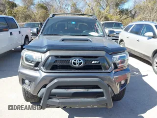 2014 Toyota Tacoma PreRunner with VIN 5TFJU4GN3EX057731, listed as a IAAI auction lot 41703750 with 110,321 mi miles. Bid and sale history available at carsss.com. Image 6.