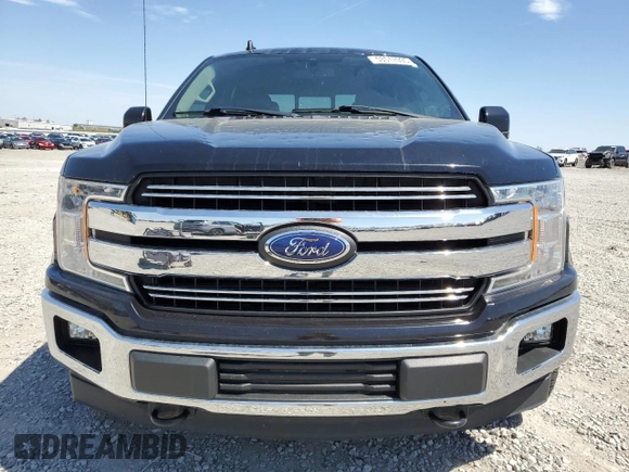 2019 Ford F-150 XL with VIN 1FTEW1E54KFB61479, listed as a Copart auction lot 53517095 with 104,201 mi miles and Salvage title. Bid and sale history available at DreamBid. Image 5.