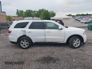 2013 Dodge Durango Crew with VIN 1C4RDJDGXDC693933, listed as a IAAI auction lot 42201796 with 169,051 mi miles and . Bid and sale history available at DreamBid. Image 14.